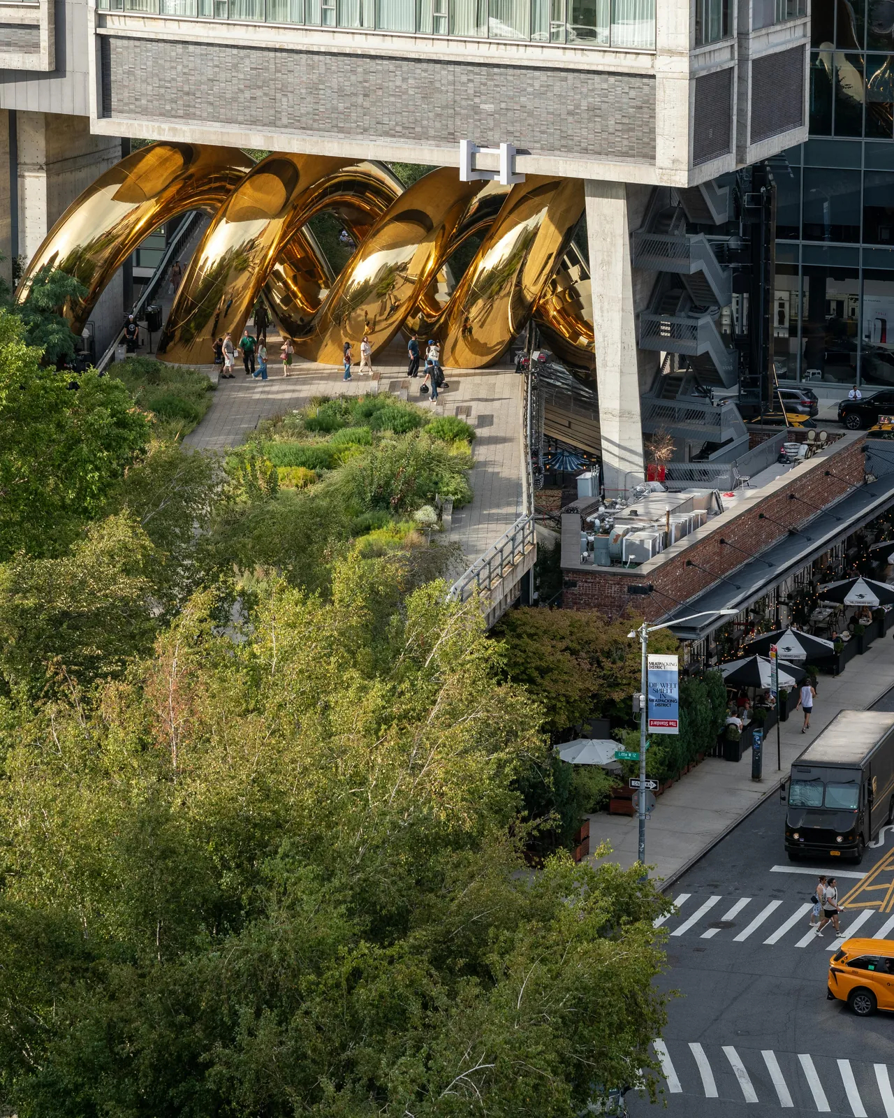 Bulgari Serpenti installation on the High Line seen from above, with greenery and the street below