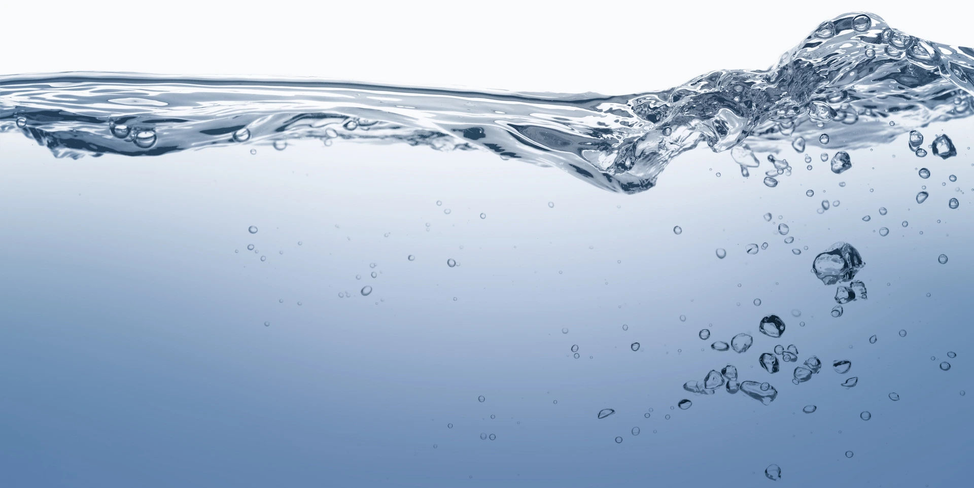 Clear water with visible surface ripples and bubbles rising underwater against a white and blue gradient background, highlighting excellent water quality and the promise of healthy drinking water.