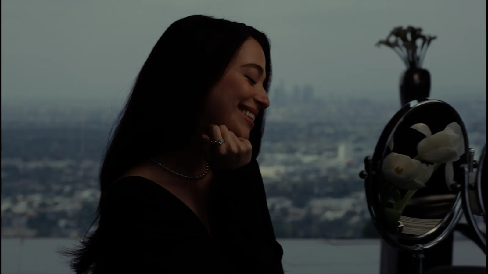 Mikey Madison in the Tiffany & Co. Love & Celebration campaign, wearing the Sixteen Stone by Tiffany ring